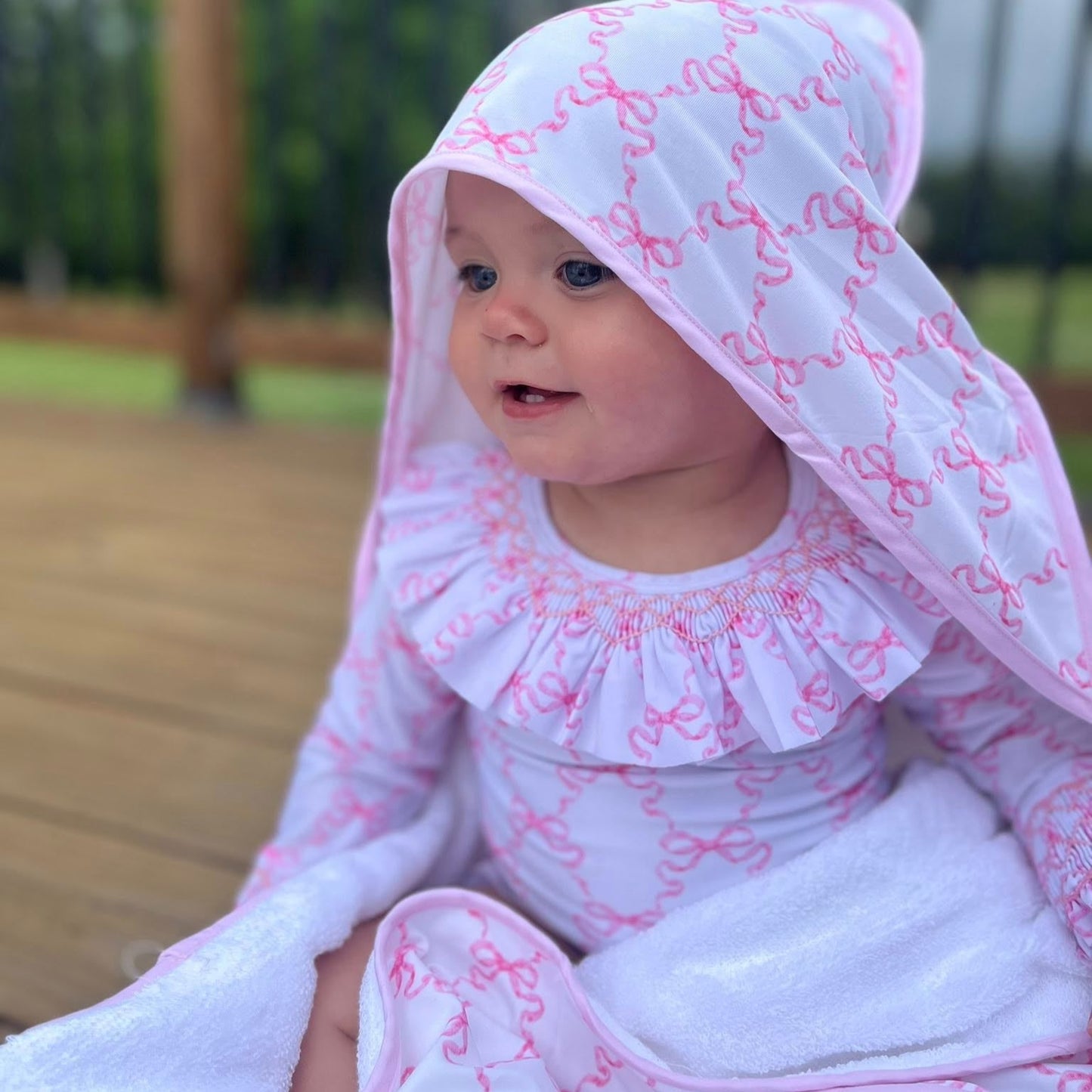 SMOCKED BOWS RASHGUARD