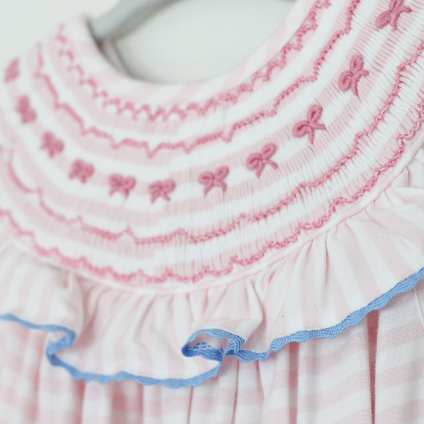 SMOCKED BOWS STRIPED KNIT BUBBLE