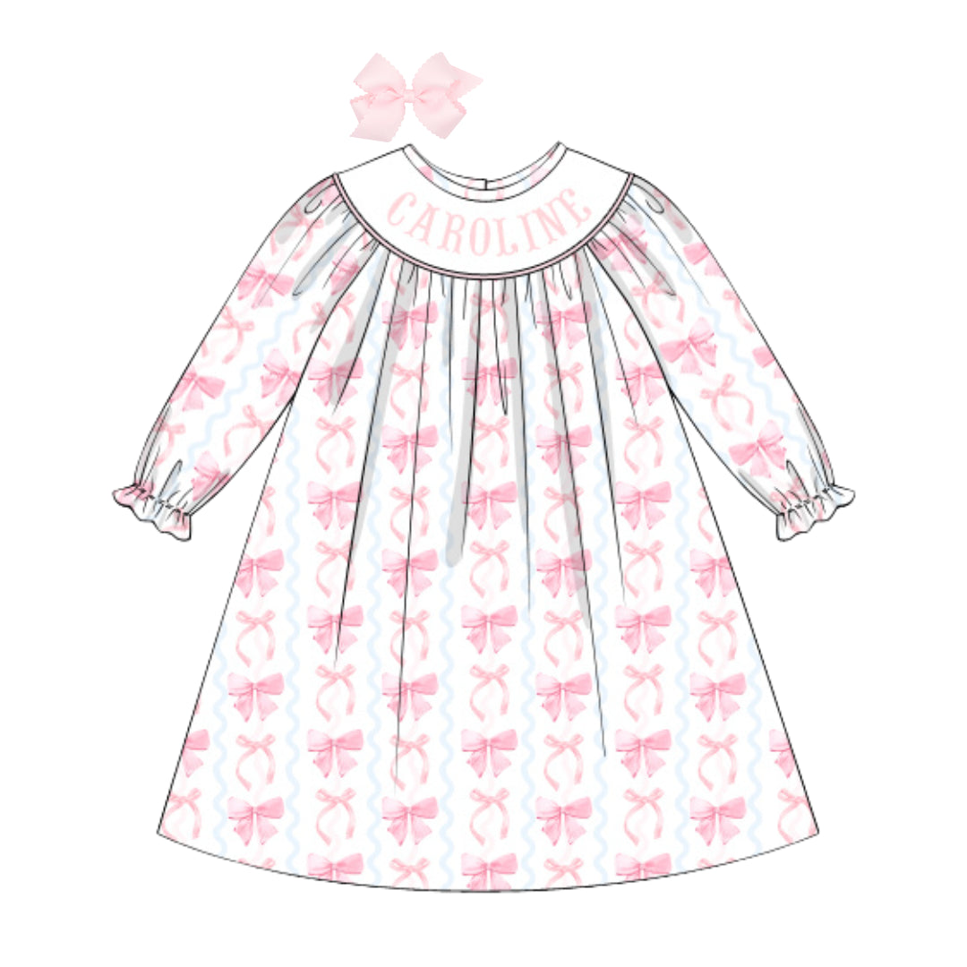 SQUIGGLE BOWS NAME SMOCKED BISHOP DRESS