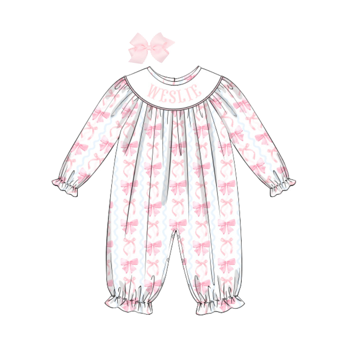 SQUIGGLE BOWS NAME SMOCKED BISHOP ROMPER