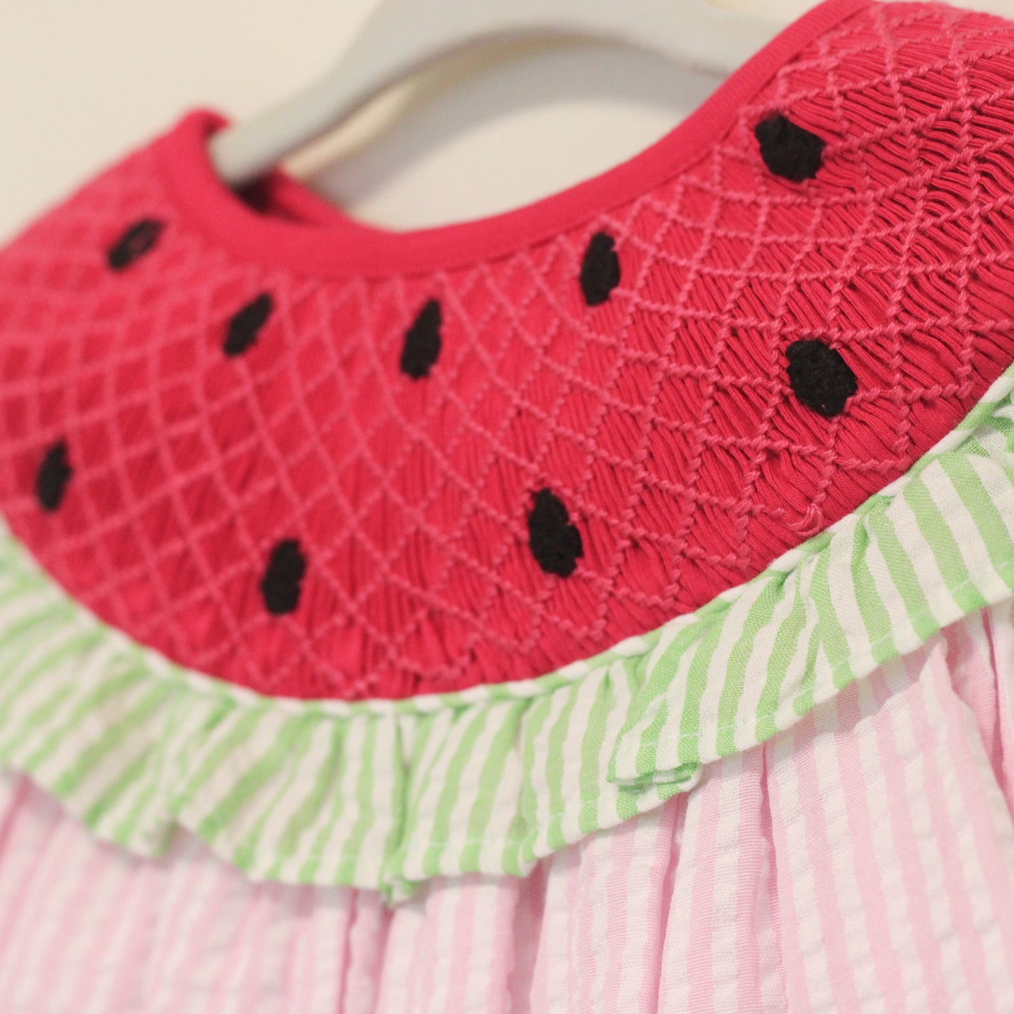 SEERSUCKER SMOCKED WATERMELON SKIRTED BUBBLE