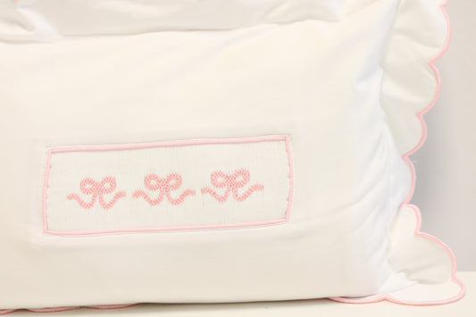 SMOCKED BOWS INFANT PILLOWCASE