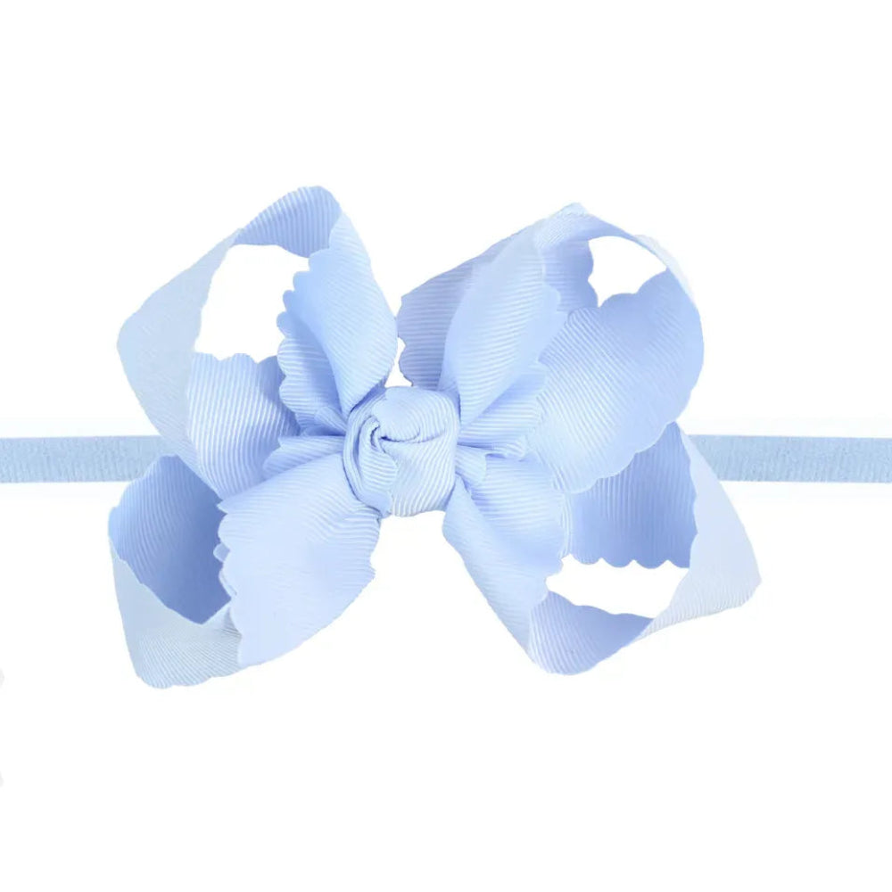 Large Scalloped Edge Bow On Nylon