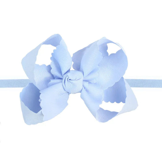 Large Scalloped Edge Bow On Nylon