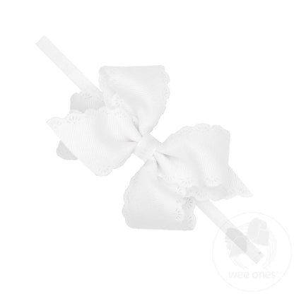 WEE ONES GROSGRAIN BOW WITH EYELET FLOWER-EMBOSSED EDGES