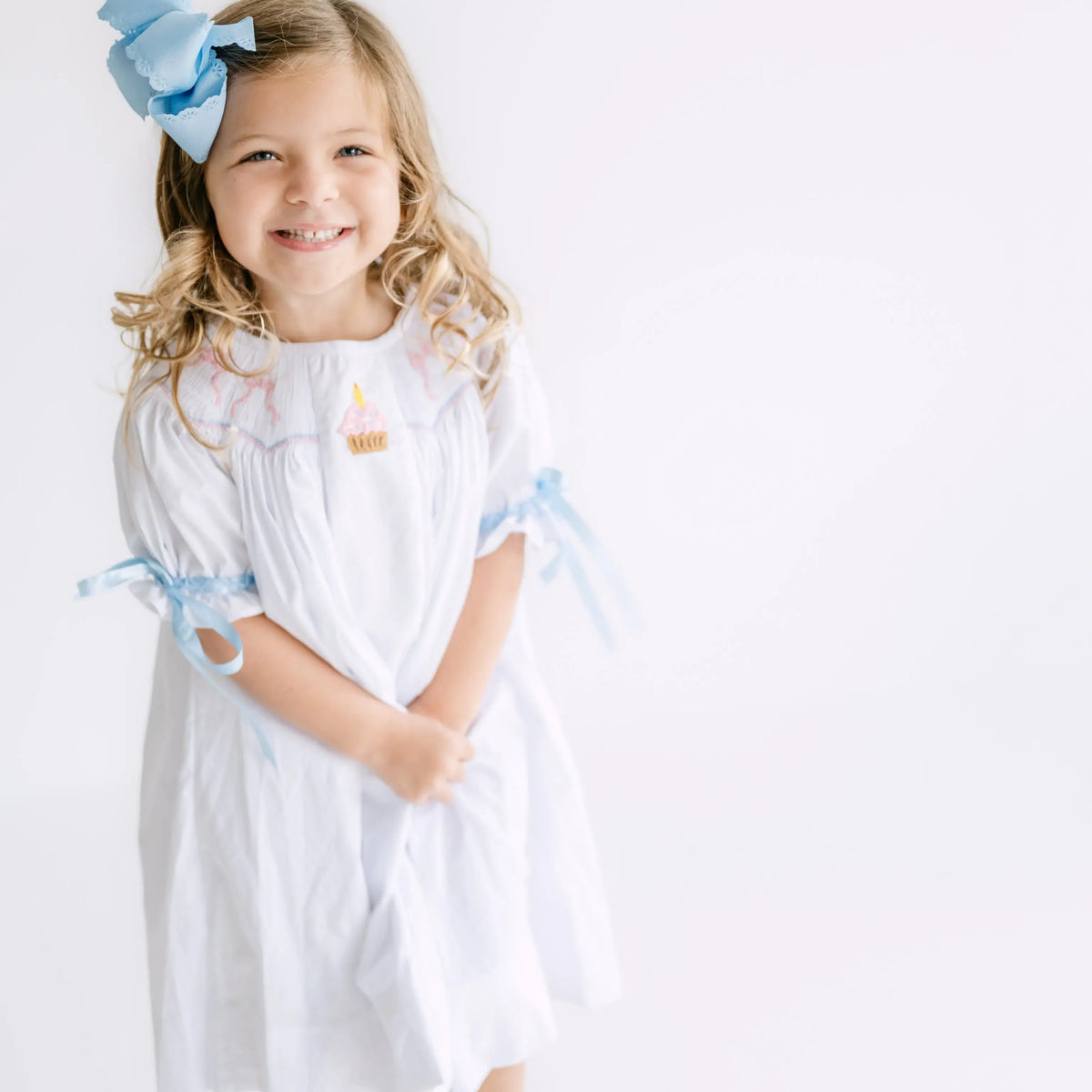 Birthday Bows Smocked Dress