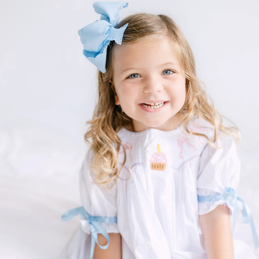 Birthday Bows Smocked Dress