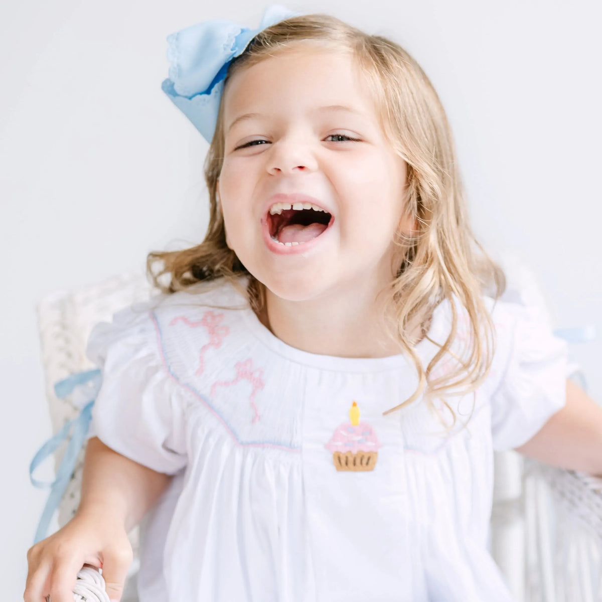 Birthday Bows Smocked Dress