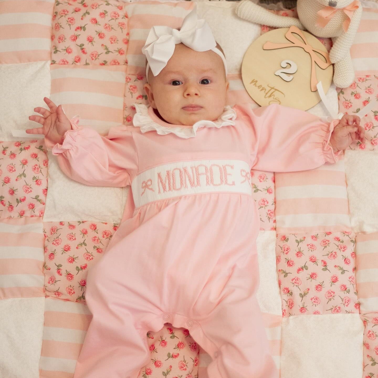 PINK KNIT BOW NAME SMOCK FOOTIE